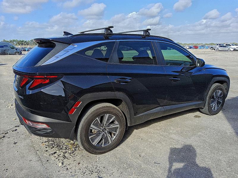Photo 3 from auction – 2024 HYUNDAI TUCSON BLU with VIN KM8JBCD12RU200205