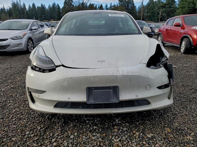 Photo 5 from auction – 2018 TESLA MODEL 3 with VIN 5YJ3E1EB4JF094854
