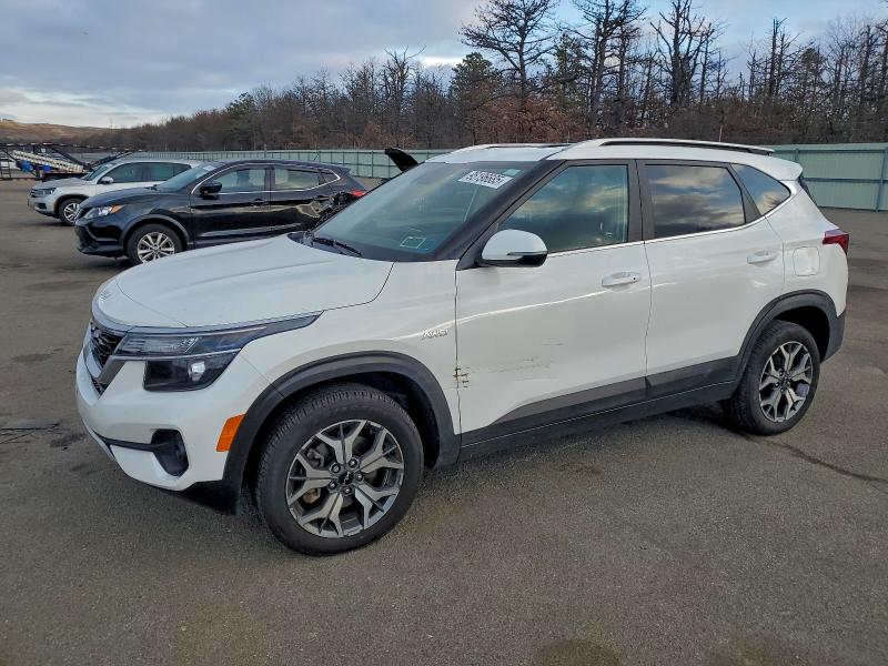 KIA SELTOS EX 2023 with VIN KNDERCAA2P7356570 - Photo from auction
