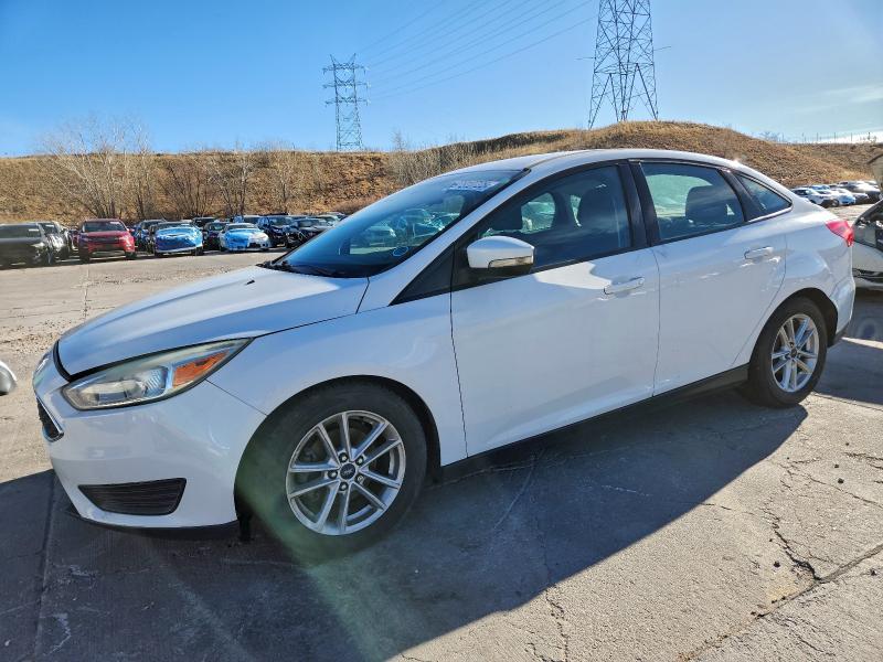 FORD FOCUS SE 2016 with VIN 1FADP3F21GL249784 - Photo from auction