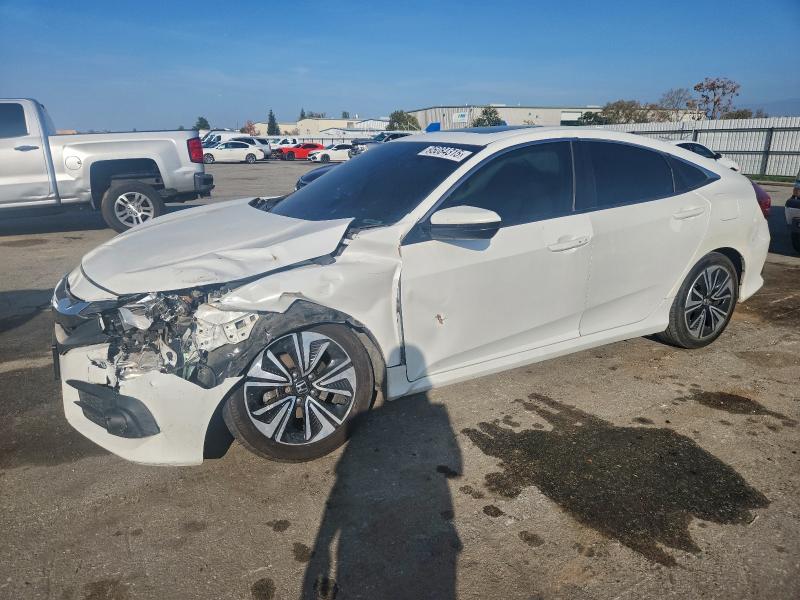 HONDA CIVIC EXL 2016 with VIN 2HGFC1F7XGH650537 - Photo from auction