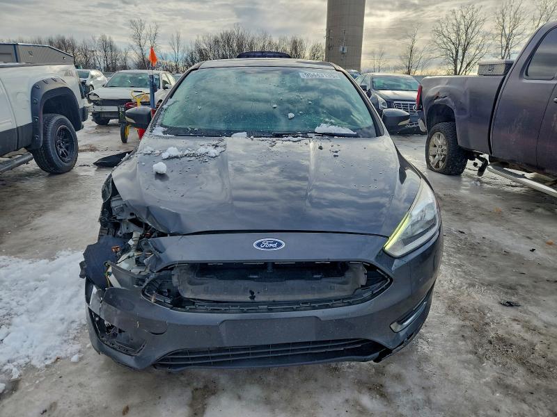 Photo 5 from auction – 2015 FORD FOCUS TITA with VIN 1FADP3N25FL384217