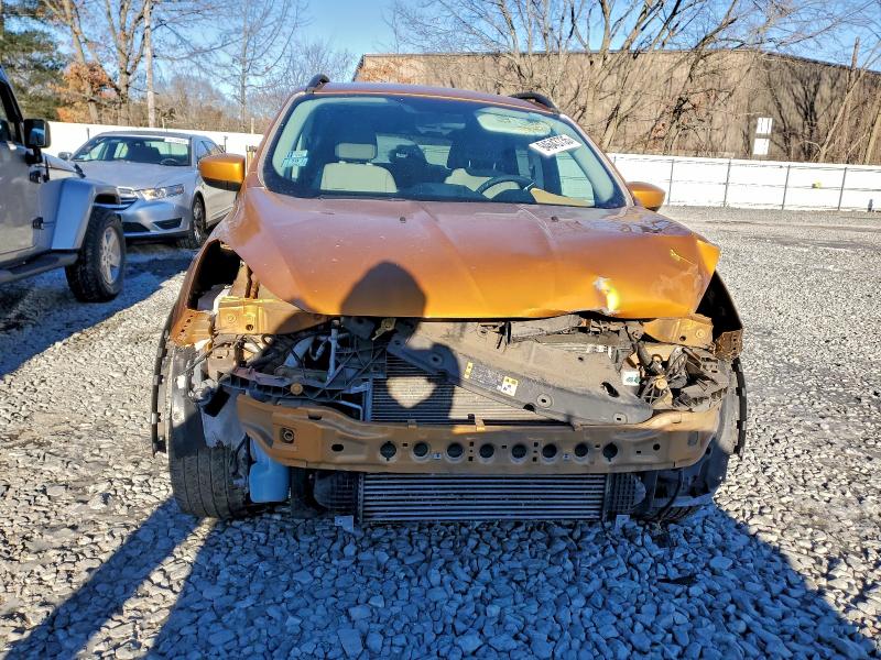 Photo 5 from auction – 2016 FORD ESCAPE SE with VIN 1FMCU9G98GUC83546