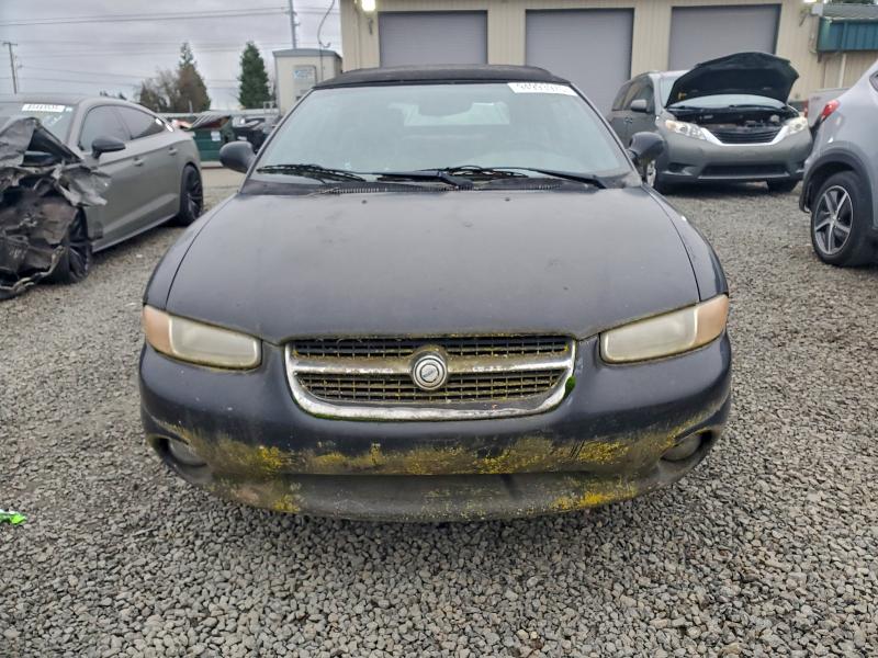 Photo 5 from auction – 1997 CHRYSLER SEBRING JX with VIN 3C3EL55H0VT537295