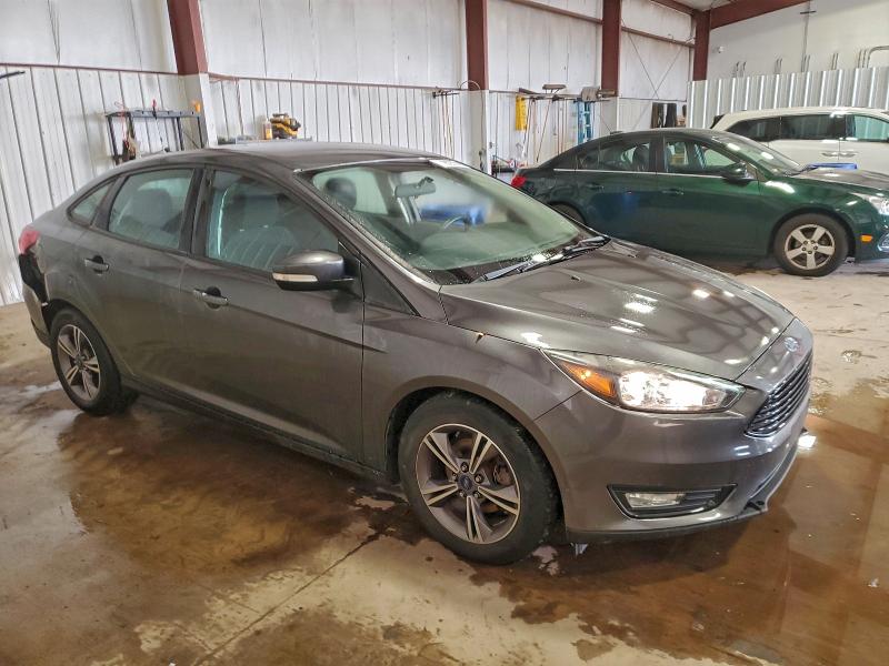 Photo 4 from auction – 2017 FORD FOCUS SE with VIN 1FADP3FE8HL259949
