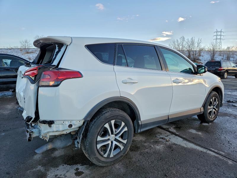 Photo 3 from auction – 2018 TOYOTA RAV4 LE with VIN 2T3BFREV8JW752882