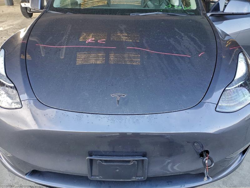 Photo 11 from auction – 2023 TESLA MODEL Y with VIN 7SAYGAEE0PF911100