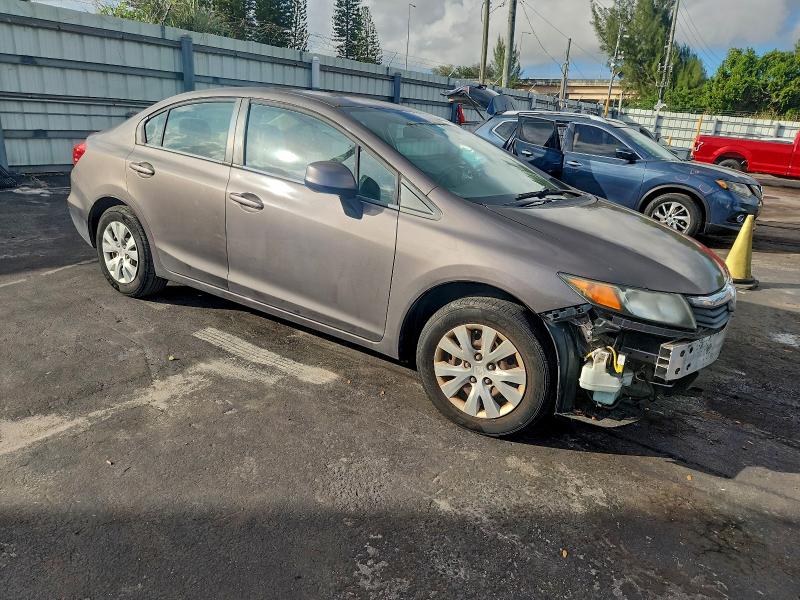 Photo 4 from auction – 2012 HONDA CIVIC LX with VIN 19XFB2F54CE011016