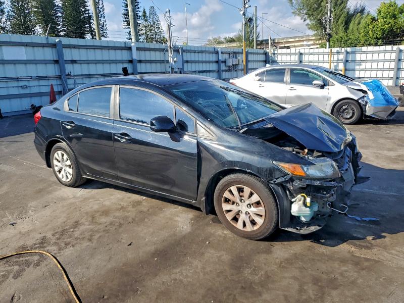Foto 4 de la subasta – 2012 HONDA CIVIC LX con VIN 19XFB2F59CE035893