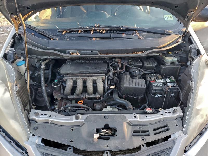Photo 11 from auction – 2009 HONDA FIT with VIN JHMGE87299S024576