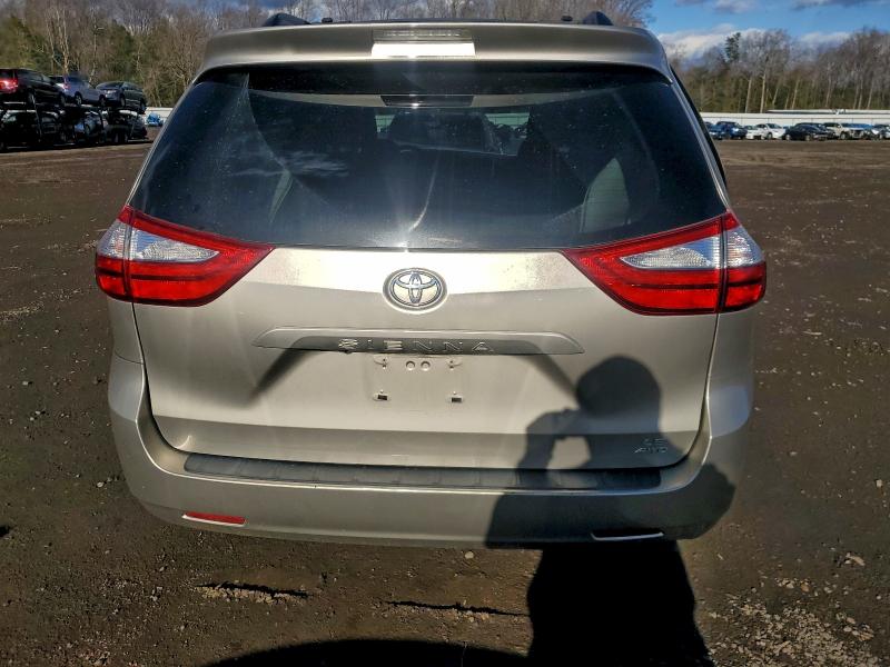Photo 6 from auction – 2015 TOYOTA SIENNA LE with VIN 5TDJK3DC9FS106571