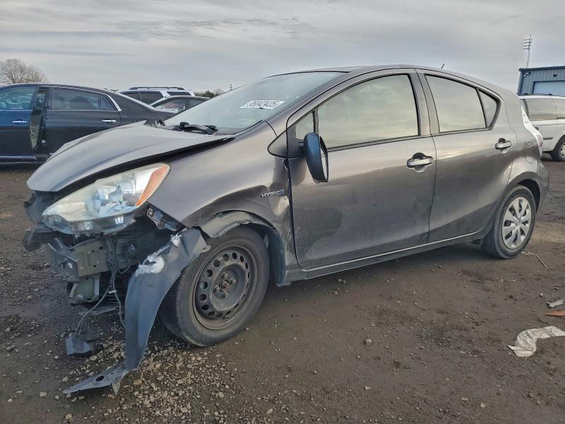 TOYOTA PRIUS C 2014 with VIN JTDKDTB39E1572482 - Photo from auction