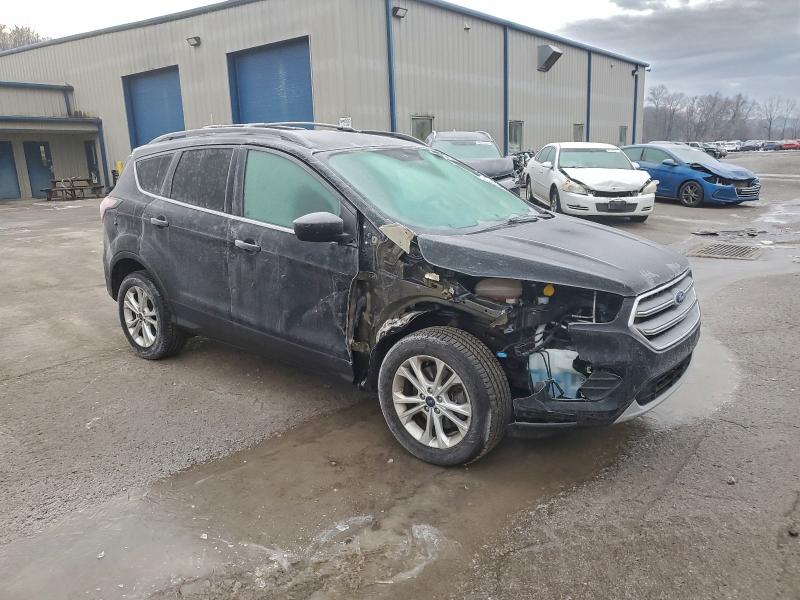 Photo 4 from auction – 2017 FORD ESCAPE SE with VIN 1FMCU9GD1HUC45842