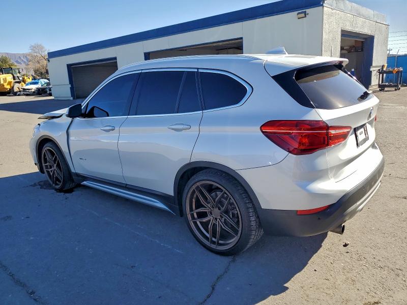 Photo 2 from auction – 2016 BMW X1 XDRIVE2 with VIN WBXHT3C3XGP888617