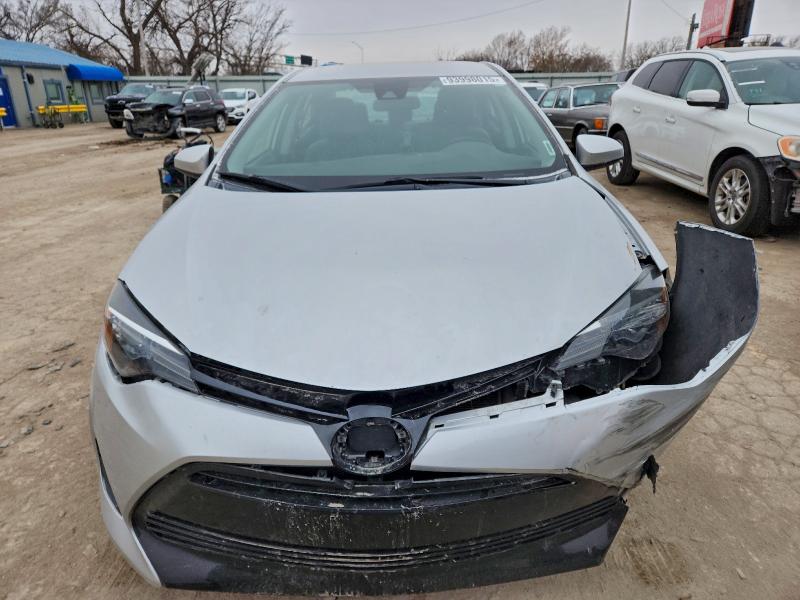 Photo 5 from auction – 2017 TOYOTA COROLLA L with VIN 5YFBURHEXHP584569