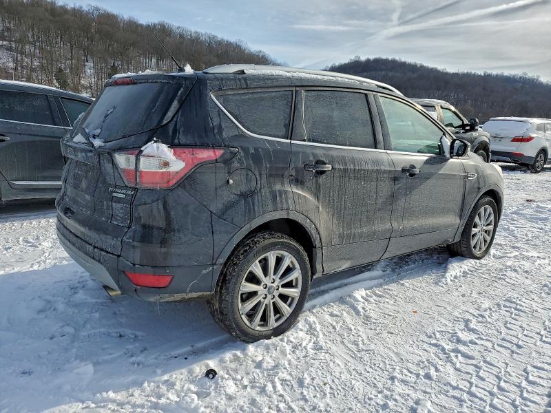 Photo 3 from auction – 2017 FORD ESCAPE TIT with VIN 1FMCU0JD8HUE32001