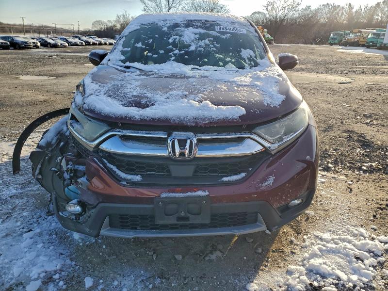 Photo 5 from auction – 2017 HONDA CR-V with VIN 7FARW1H80HE012625
