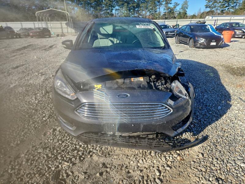 Photo 5 from auction – 2015 FORD FOCUS TITA with VIN 1FADP3N27FL386633