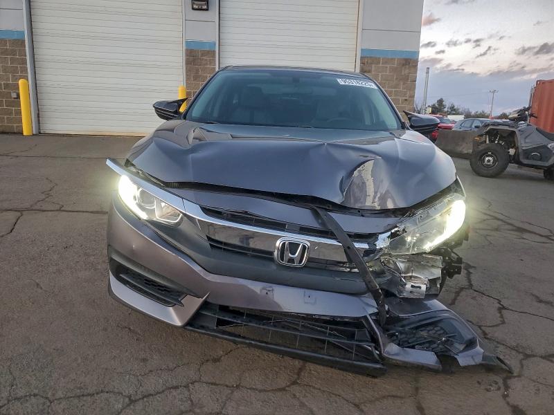 Photo 5 from auction – 2017 HONDA CIVIC LX with VIN 19XFC2F58HE203351