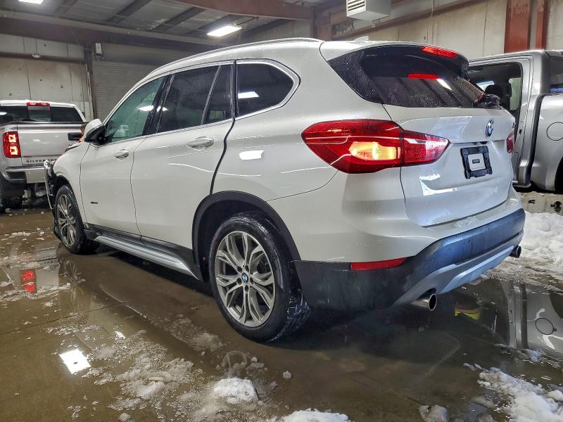 Photo 2 from auction – 2017 BMW X1 XDRIVE2 with VIN WBXHT3C39H5F76997