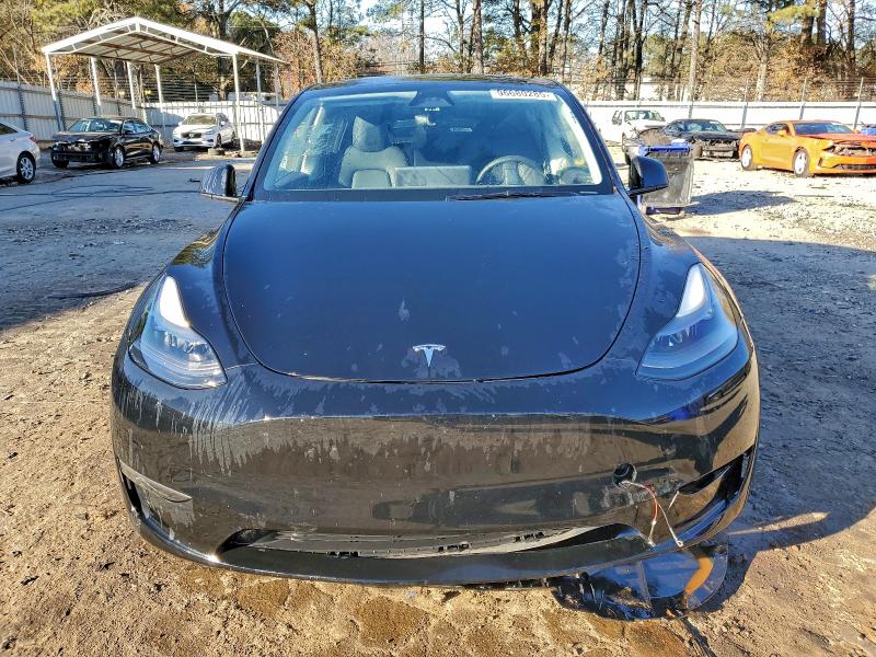 Photo 5 from auction – 2023 TESLA MODEL Y with VIN 7SAYGDEE5PA185149