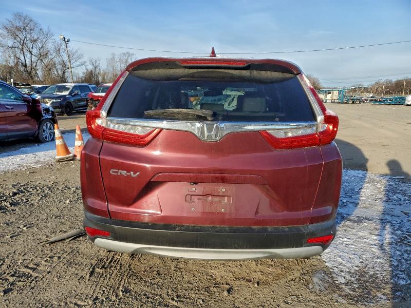 Photo 6 from auction – 2017 HONDA CR-V with VIN 7FARW1H80HE012625