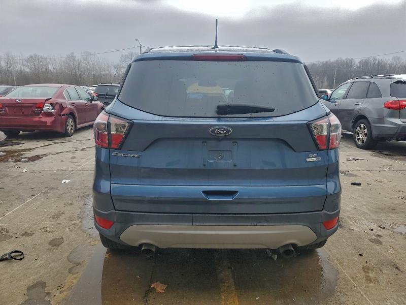 Photo 6 from auction – 2018 FORD ESCAPE SE with VIN 1FMCU9GD9JUA06626