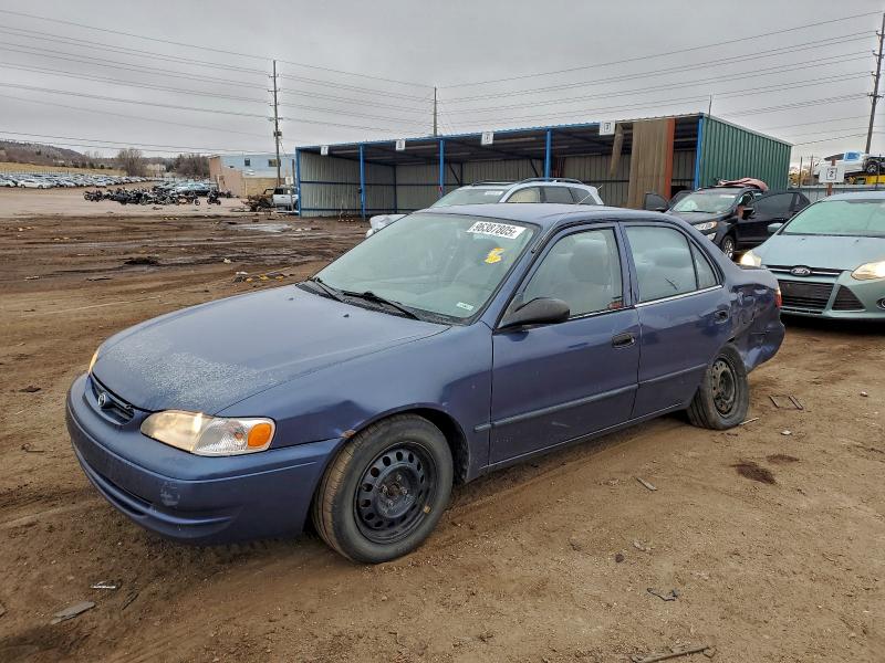 TOYOTA COROLLA 2000 with VIN 1NXBR12E7YZ385926 - Photo from auction