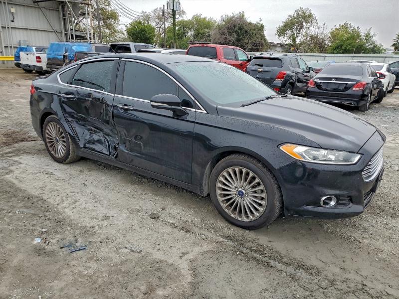 Photo 4 from auction – 2016 FORD FUSION TIT with VIN 3FA6P0K98GR175193