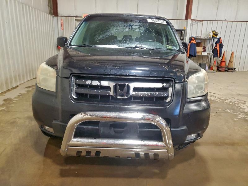 Photo 5 from auction – 2006 HONDA PILOT EX with VIN 5FNYF18526B011499