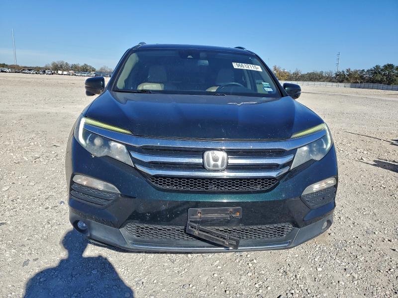 Photo 5 from auction – 2016 HONDA PILOT with VIN 5FNYF5H90GB060115