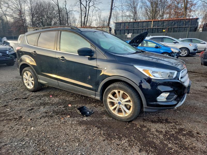 Photo 4 from auction – 2018 FORD ESCAPE SE with VIN 1FMCU9GD3JUC25422