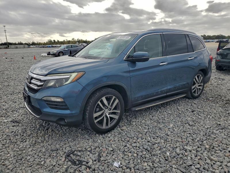 HONDA PILOT TOUR 2017 with VIN 5FNYF6H91HB028670 - Photo from auction
