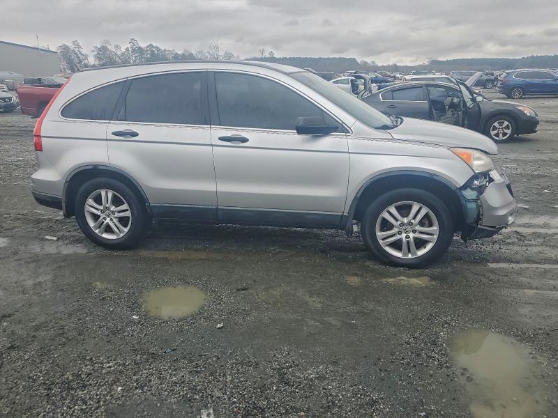 Photo 4 from auction – 2011 HONDA CR-V with VIN JHLRE3H53BC016093
