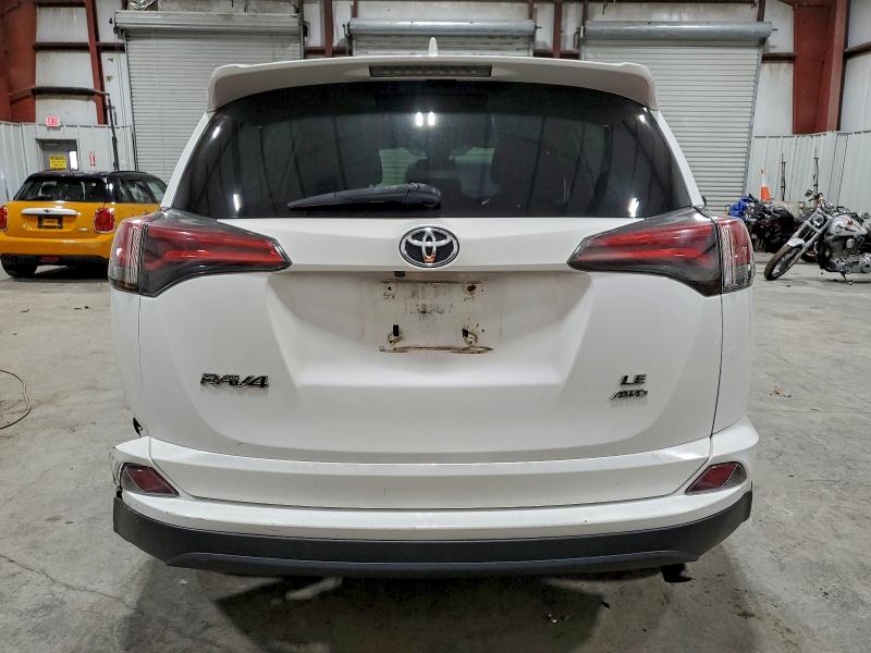 Photo 6 from auction – 2018 TOYOTA RAV4 LE with VIN 2T3BFREV5JW752855