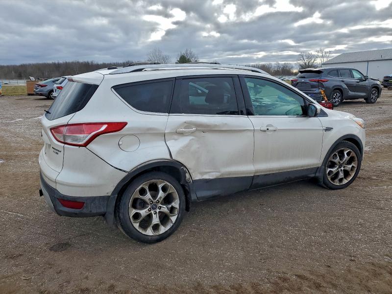 Photo 3 from auction – 2013 FORD ESCAPE TIT with VIN 1FMCU9J99DUC43352