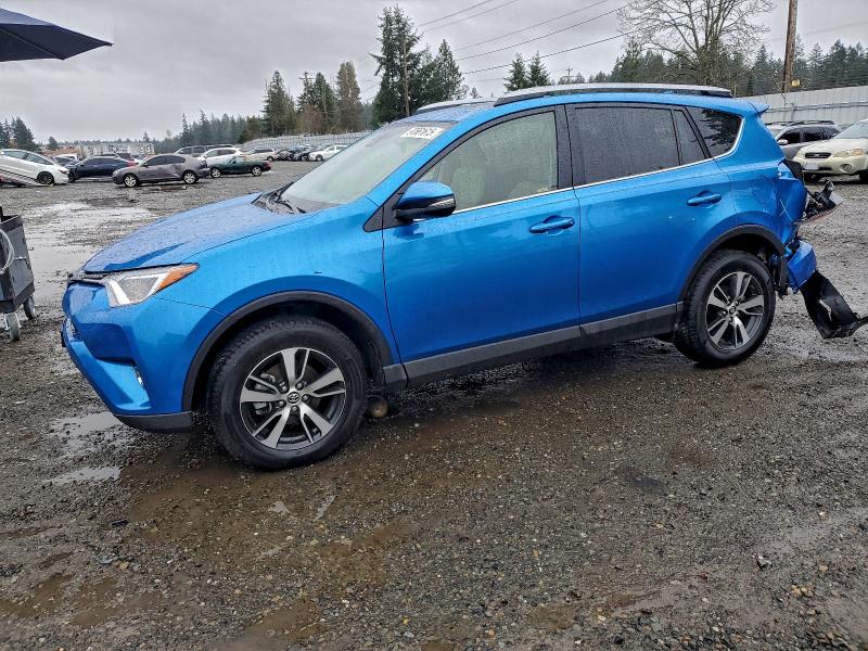 Photo 1 from auction – 2017 TOYOTA RAV4 XLE with VIN JTMRFREV0HJ105965