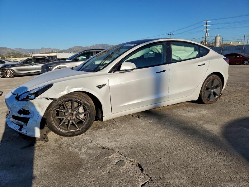 TESLA MODEL 3 2023 with VIN 5YJ3E1EAXPF575062 - Photo from auction