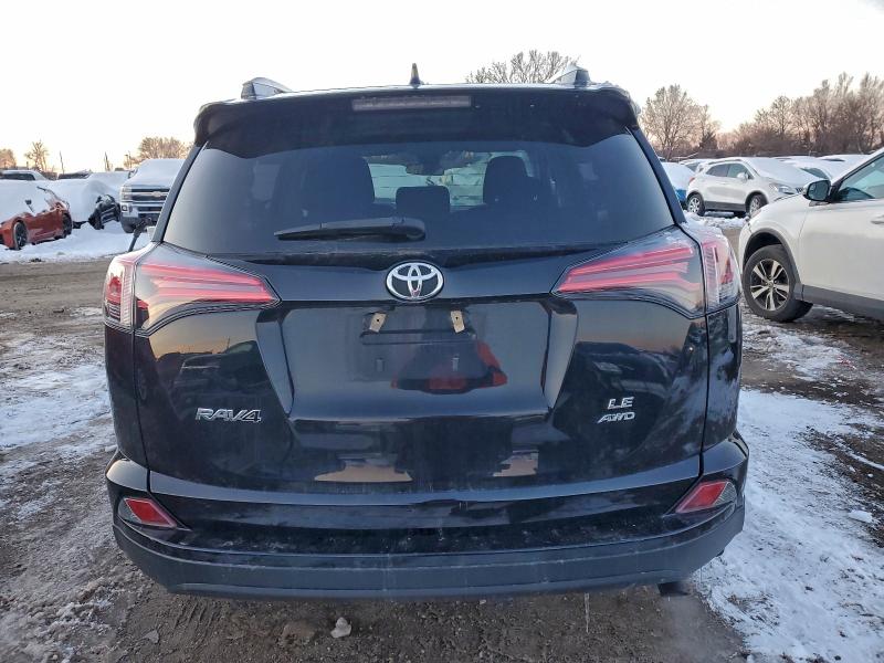 Photo 6 from auction – 2018 TOYOTA RAV4 LE with VIN 2T3BFREV0JW807714