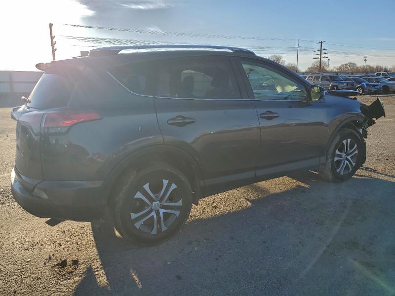 Photo 3 from auction – 2016 TOYOTA RAV4 LE with VIN JTMBFREV2GJ066604