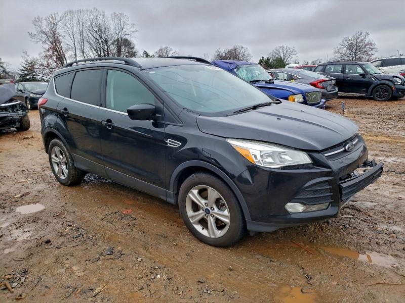 Photo 4 from auction – 2015 FORD ESCAPE SE with VIN 1FMCU9G97FUC67143
