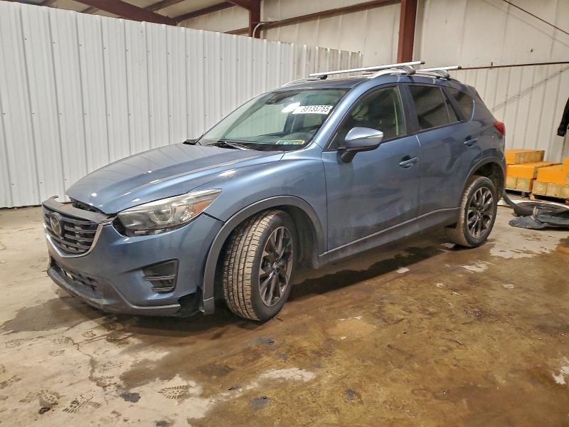 MAZDA CX-5 GT 2016 with VIN JM3KE4DY8G0727423 - Photo from auction