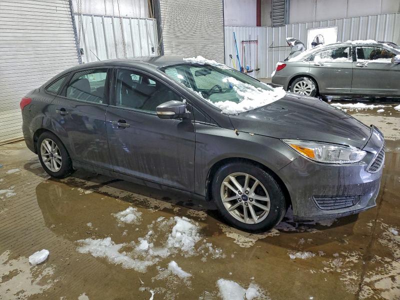 Photo 4 from auction – 2016 FORD FOCUS with VIN 1FADP3F25GL327726
