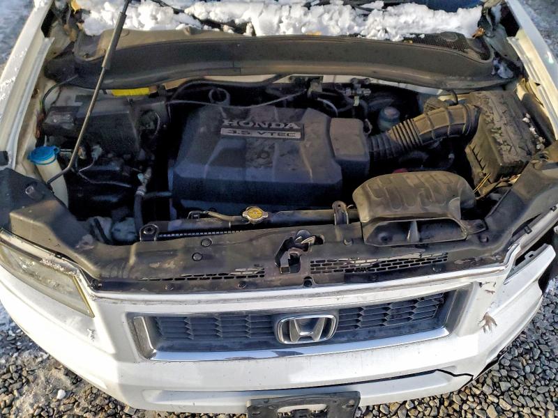 Photo 11 from auction – 2007 HONDA RIDGELINE with VIN 2HJYK16387H504236