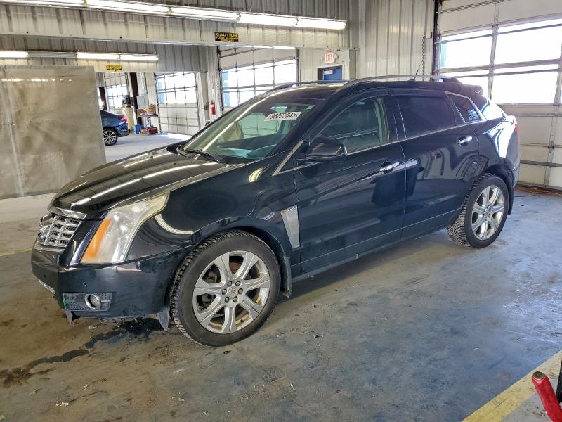 CADILLAC SRX PREMIU 2013 with VIN 3GYFNJE32DS618319 - Photo from auction