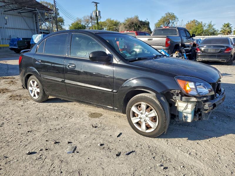 Photo 4 from auction – 2011 KIA RIO BASE with VIN KNADH4A39B6851639