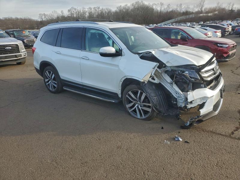 Photo 4 from auction – 2016 HONDA PILOT ELIT with VIN 5FNYF6H08GB098800