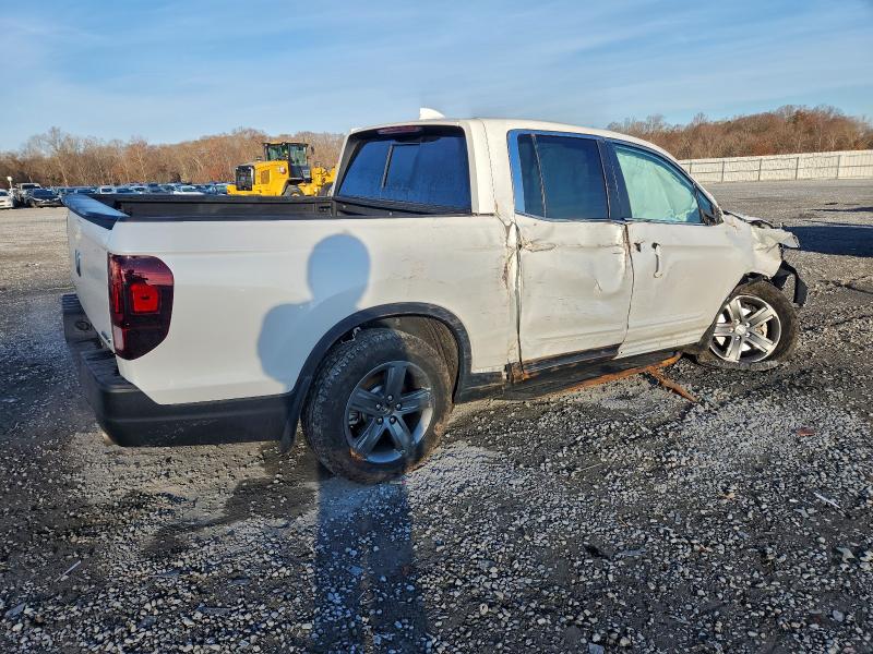 Photo 3 from auction – 2022 HONDA RIDGELINE with VIN 5FPYK3F59NB037341
