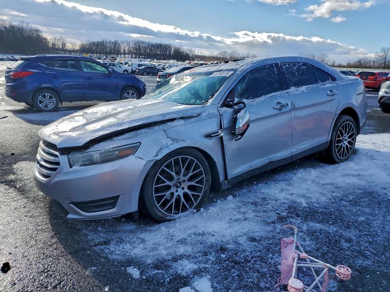 FORD TAURUS LIM 2014 with VIN 1FAHP2J84EG155959 - Photo from auction