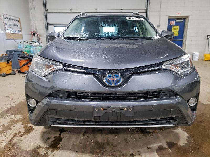 Photo 5 from auction – 2016 TOYOTA RAV4 HV LI with VIN JTMDJREVXGD024509